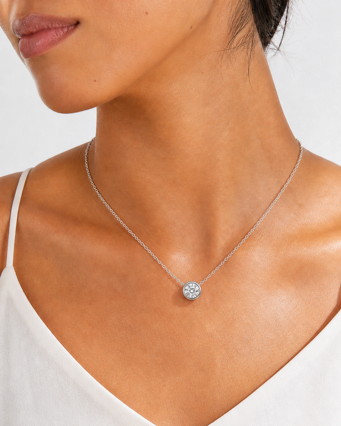 1.0ct (6.5mm) classic moissanite pendant, best-selling size on wrist.