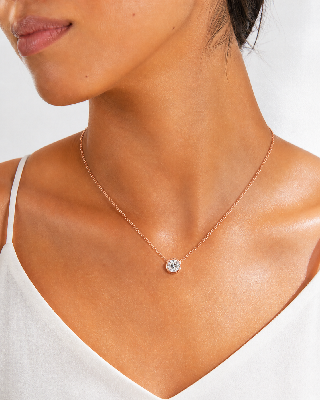 1.0ct (6.5mm) classic moissanite pendant, best-selling size on wrist.