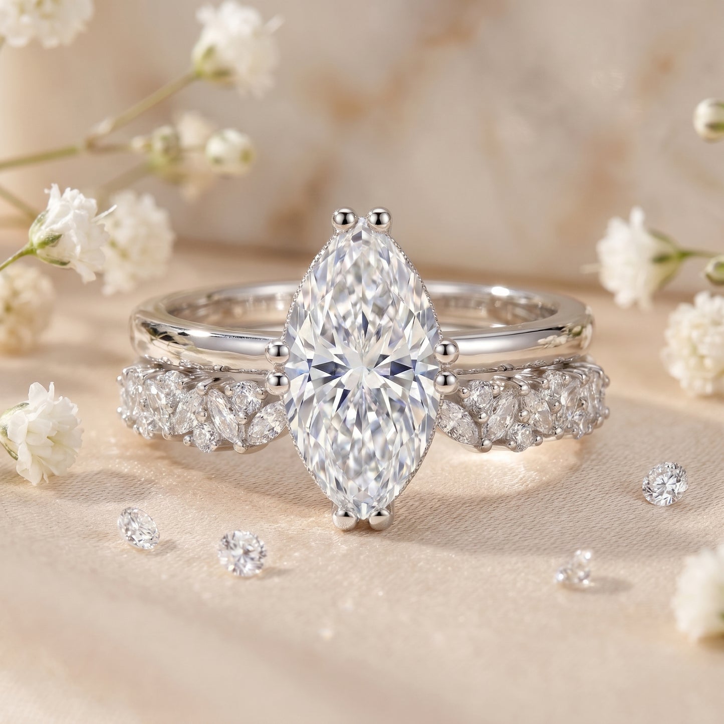 Luxury 2-piece stackable moissanite wedding ring set beautifully displayed on a neutral textured surface with delicate white floral accents.