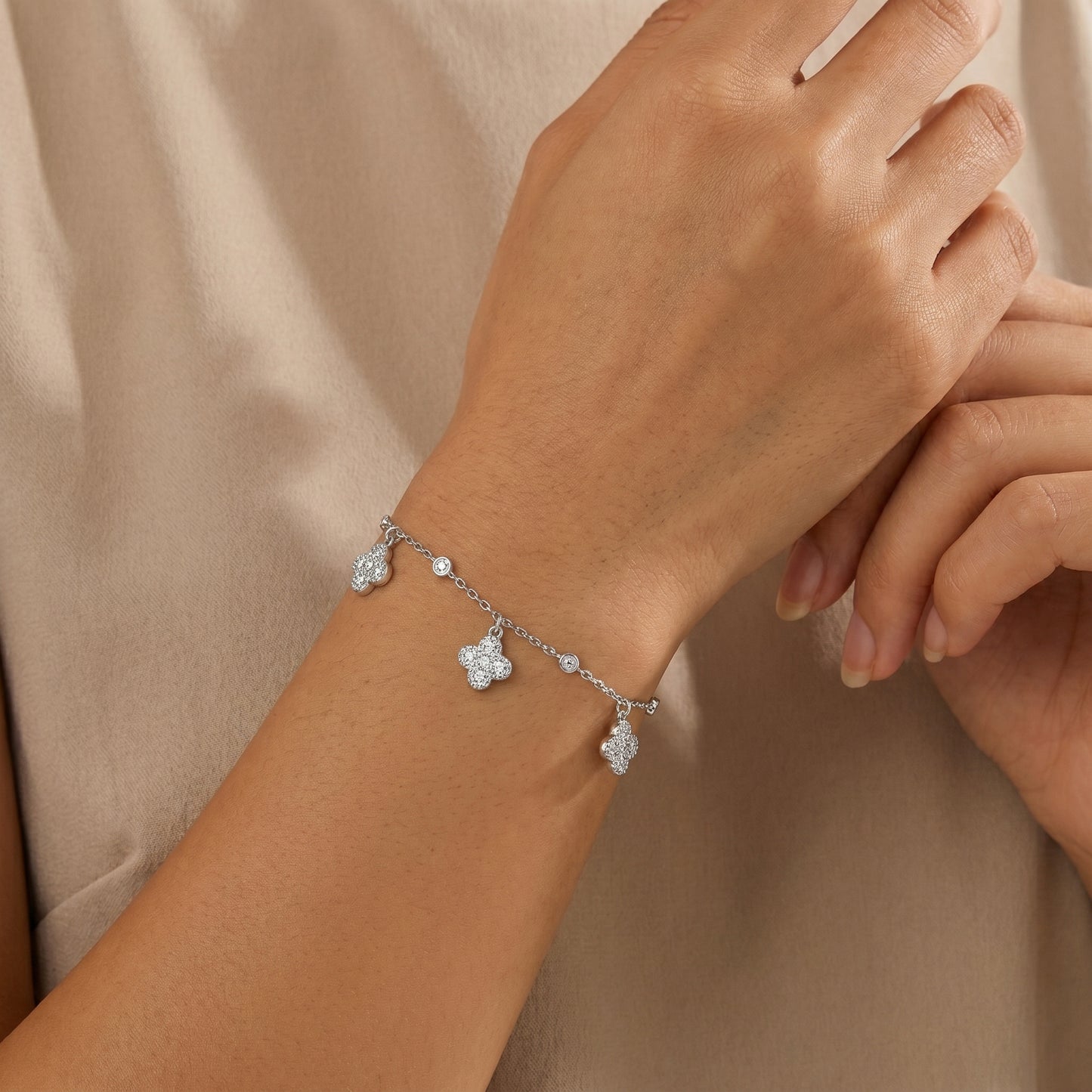 Clover moissanite bracelet styled with a quiet luxury look