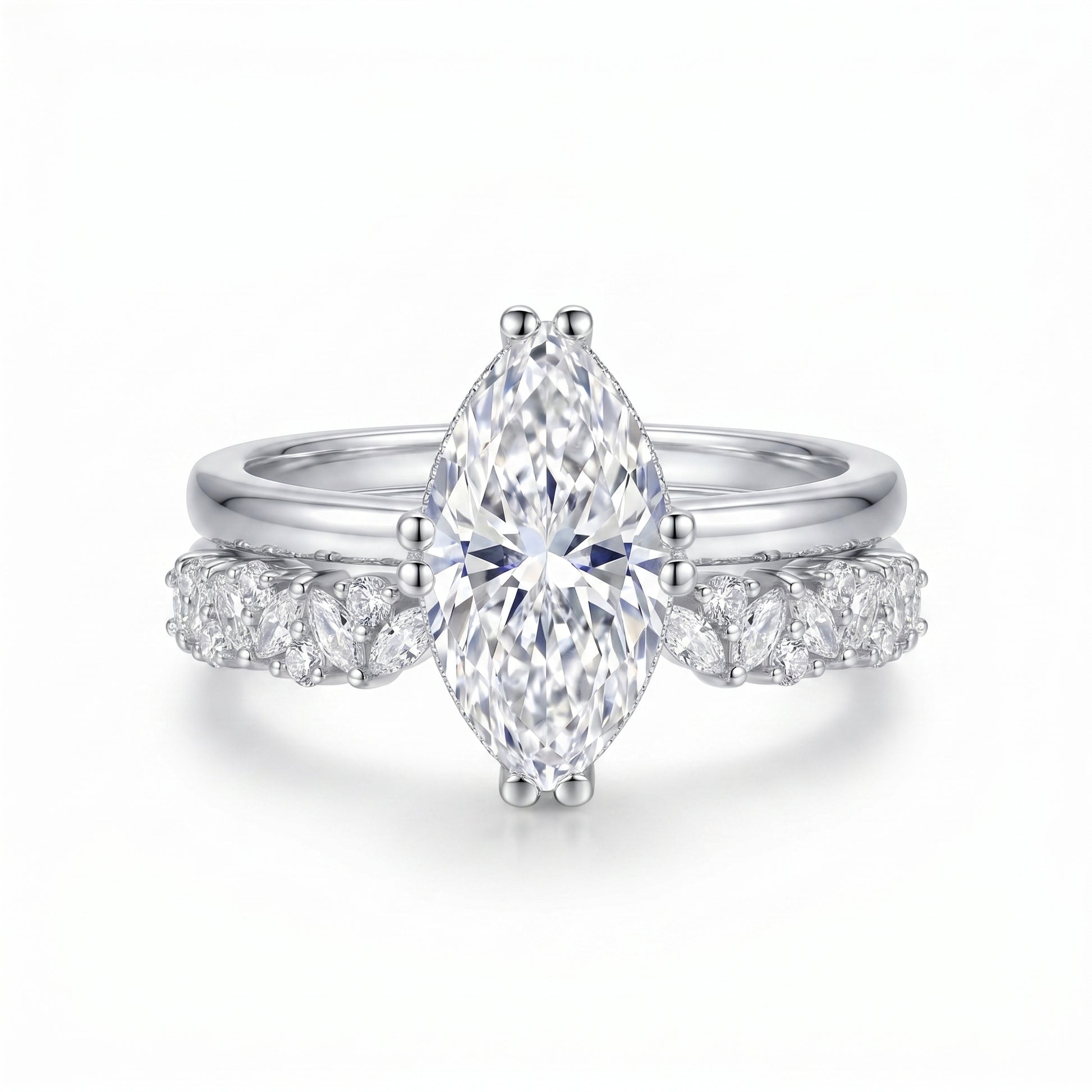 Front view of a solid 925 sterling silver 18K white gold plated marquise solitaire ring nested perfectly within a micropavé matching band.