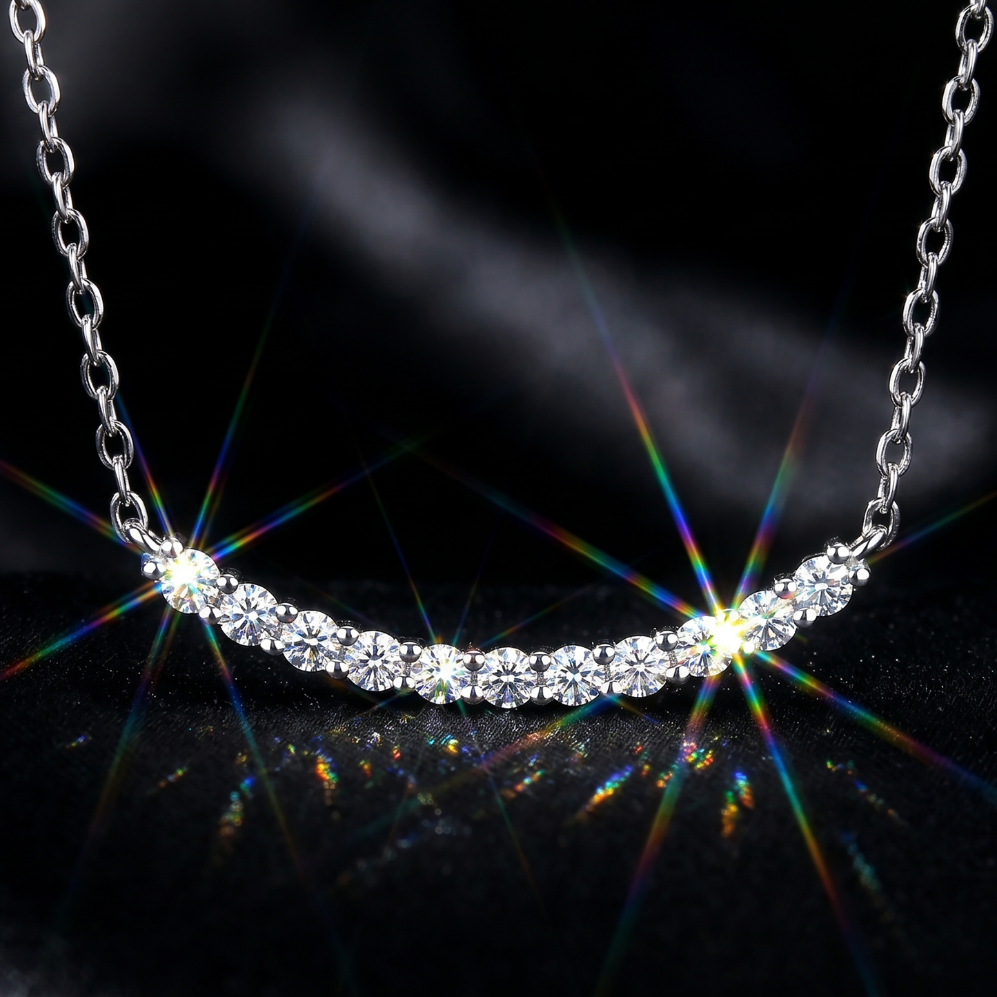 Silver curved moissanite bar necklace with brilliant rainbow fire on black background