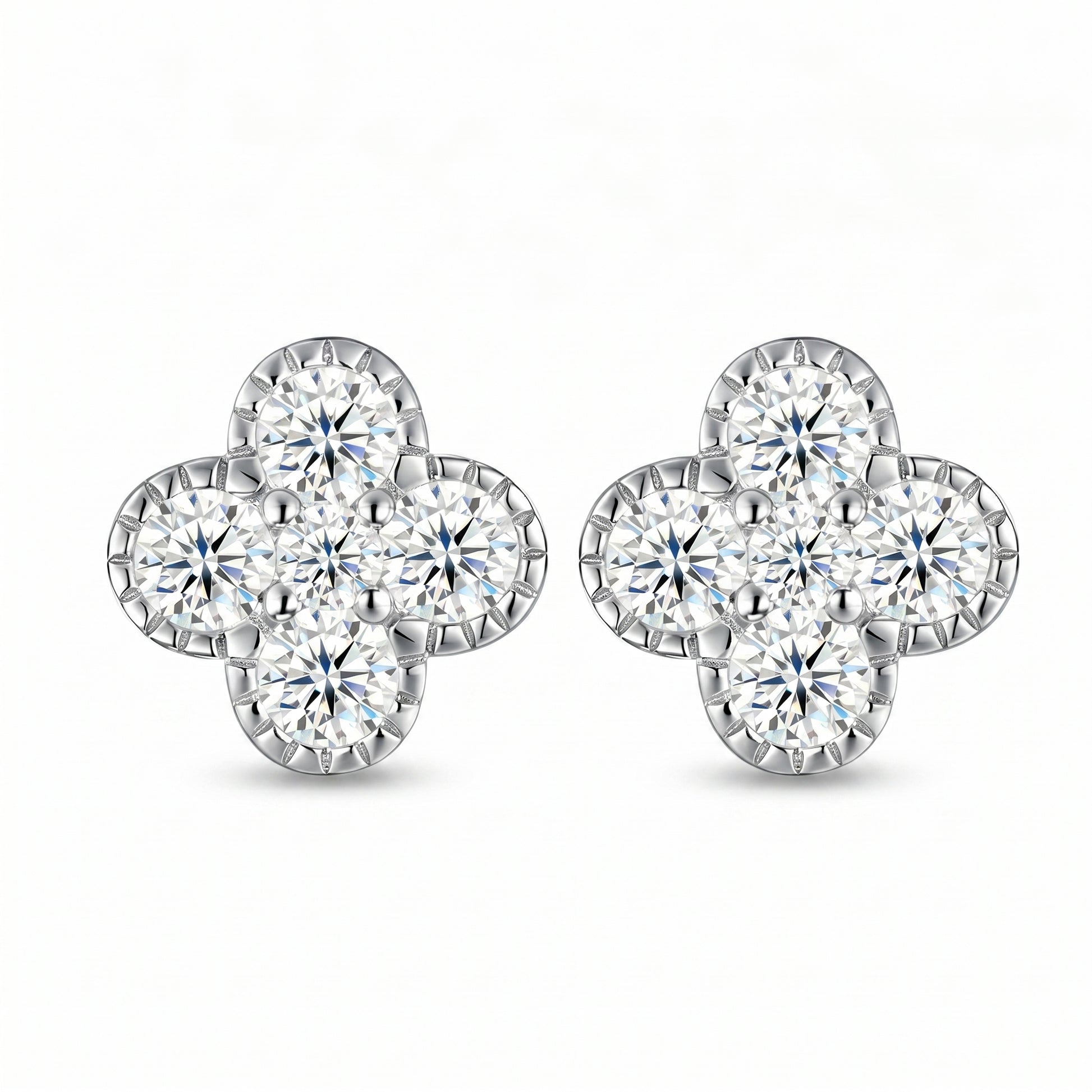 Pair of four-flower moissanite stud earrings on white background