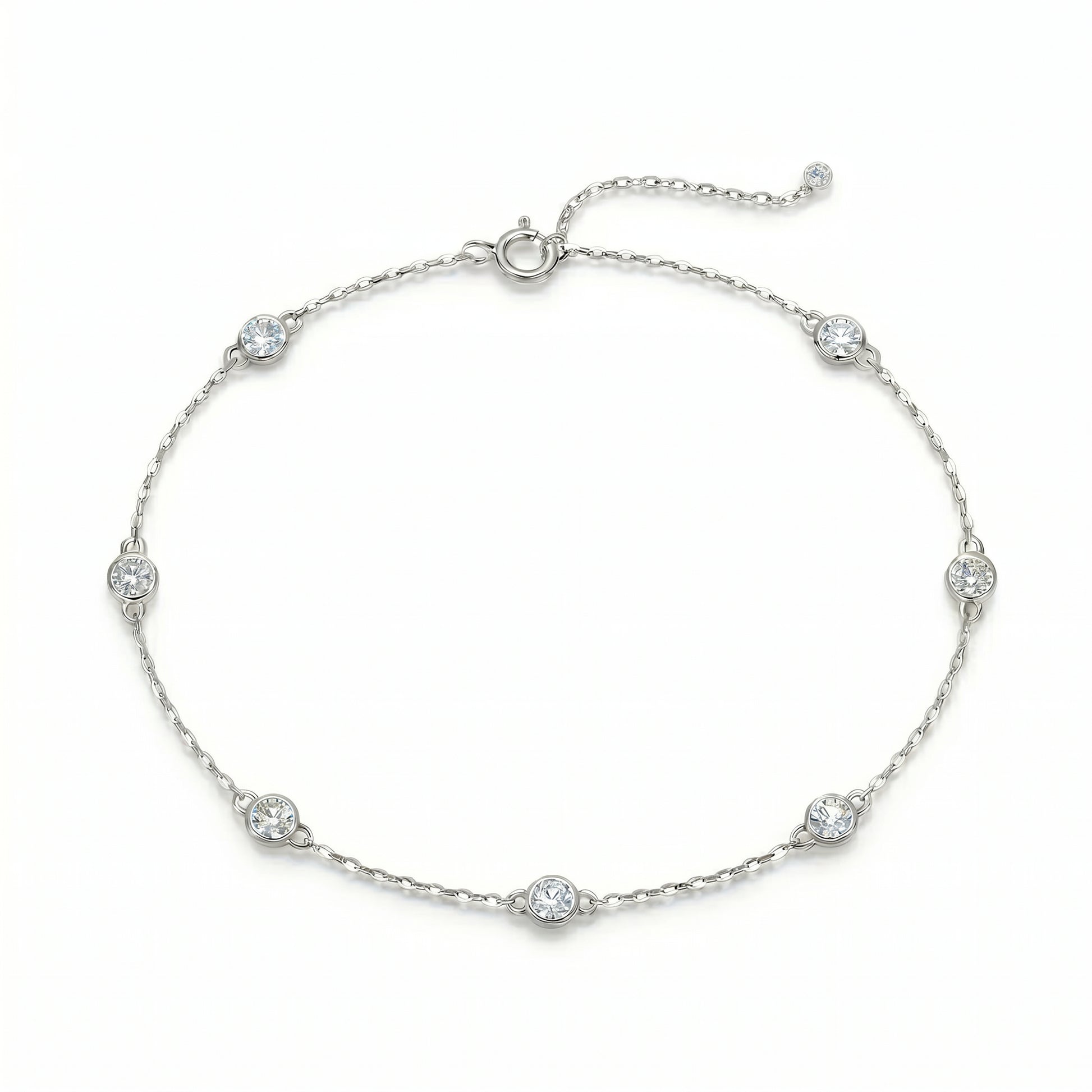 Luvia Jewelers seven-stone moissanite station bracelet in solid 925 sterling silver with adjustable chain.